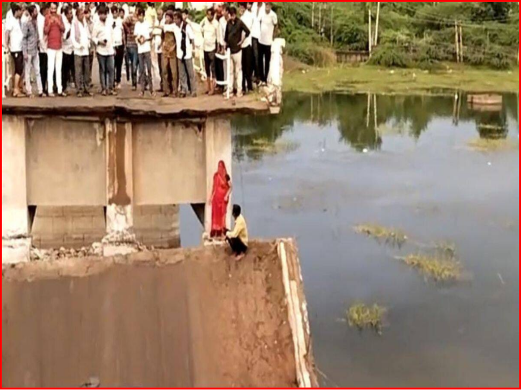 Vastadi - Part of bridge connecting Vastadi-Chuda collapsed, four washed away; Luckily Averting Casualties.