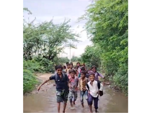 The stark reality of the development model: Lakhtar's Vitthalgarh Pvt. The students of the school have to go to school from the water and mud-swamp