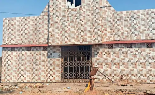 An arched lock at a municipal-run toilet on the Tagorbagh main road in Surendranagar