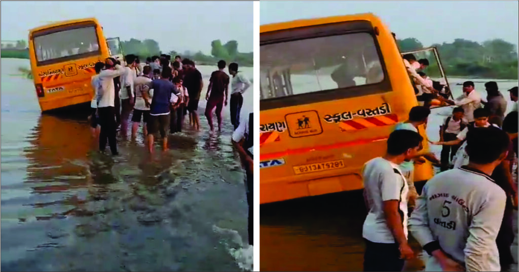 A school bus got stuck when the diversion was washed away at Vastadi village in Surendranagar