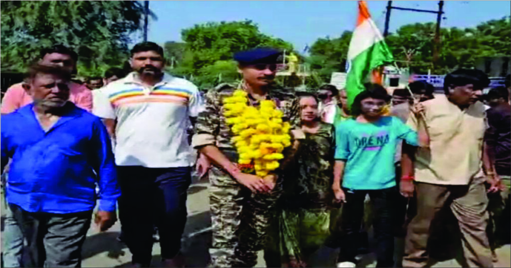 A jawan returning to his native Lakhtar after retirement from CRPF is welcomed by his family and villagers